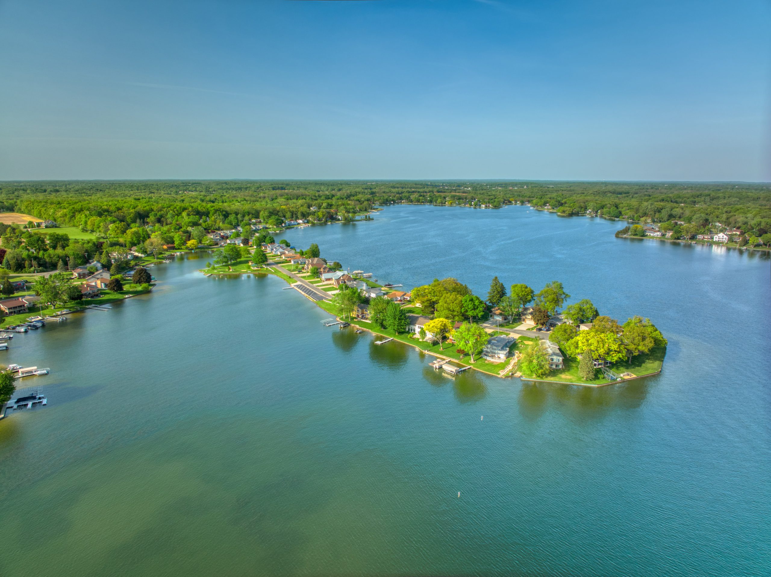 Aerial view of a lake and shoreline in the Irish Hills
